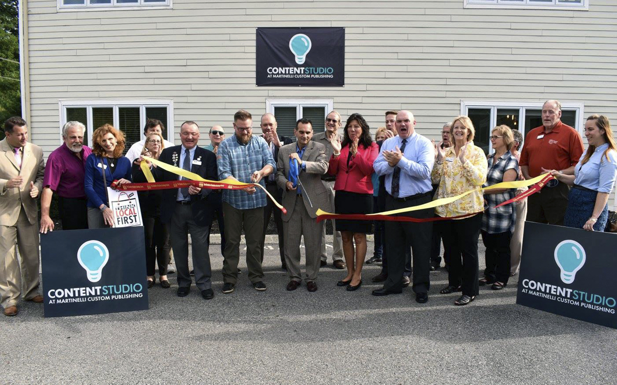 Thomas Martinelli and Josiah Brown, Co-Founders of Content Studio, cutting the ribbon at the launch of the new division.